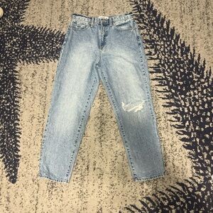 Mid rise medium wash straight leg jeans